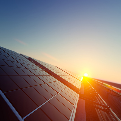 Renewable energy solar panels at sunrise