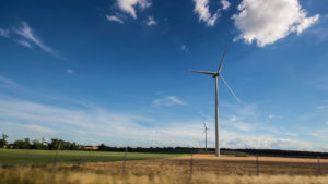 A wind turbine in a field
