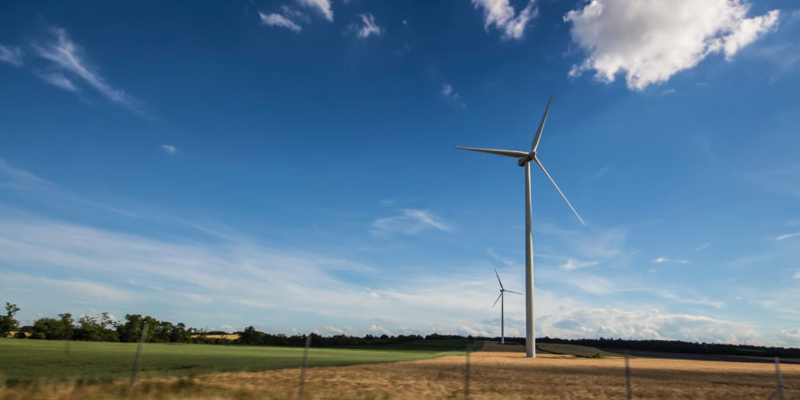 A wind turbine in a field