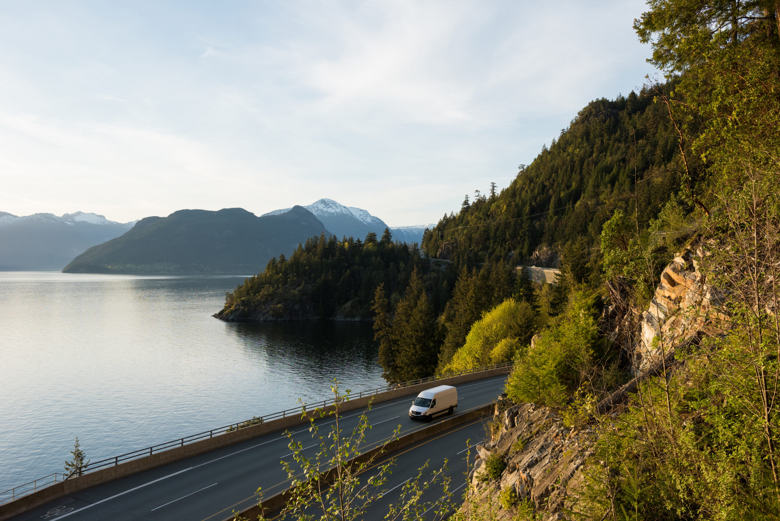 Delivery truck driving along Highway 99, BC, Canada