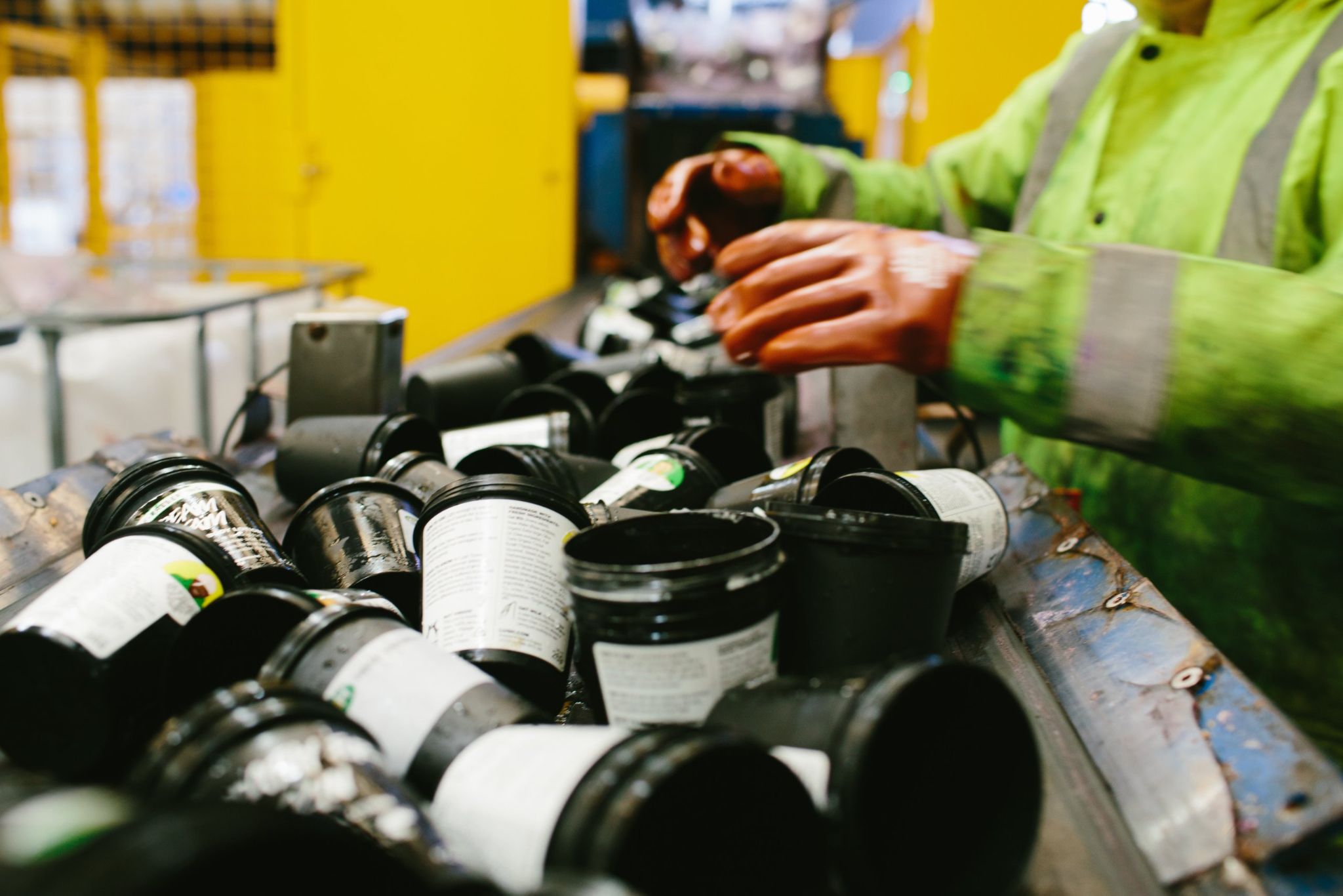 LUSH LUSH black pots being washed for recycling